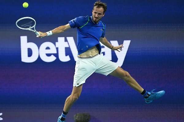 Daniil Medvedev serves past Quentin Halys in Miami Open. 