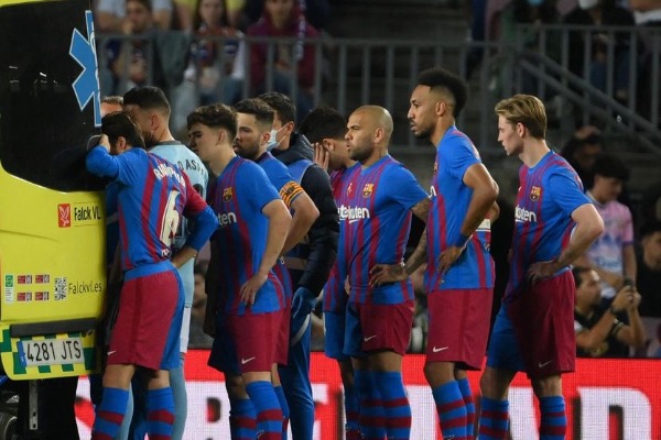 Barcelona defender Ronald Araujo was taken to hospital after being concussed in a league game against Celta Vigo.