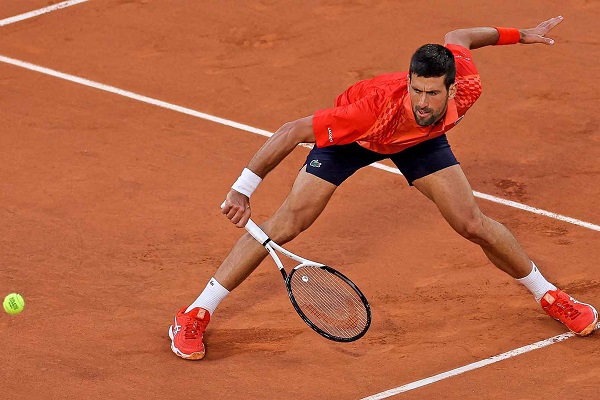 Djokovic defeats Fucsovics and advances to third round at Roland Garros.